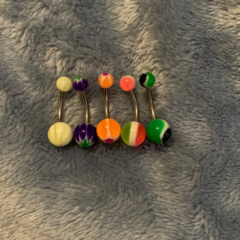 5 belly piercings, good condition